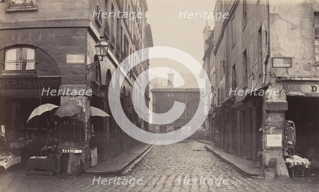 Rue du Contrat-Social, de la rue de la Tonnellerie, 1864-1865. Creator: Charles Marville.