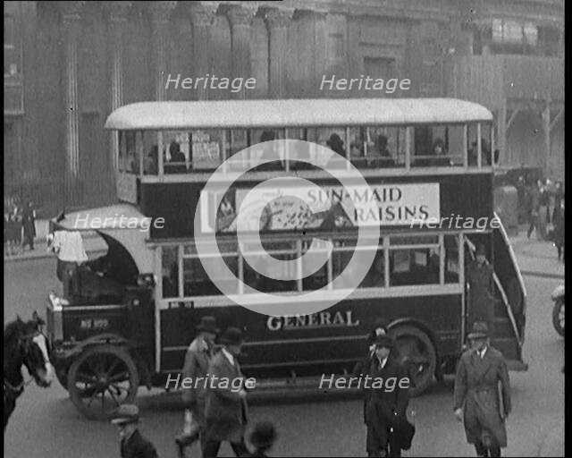 Buses Driving in Busy London Streets, 1929. Creator: British Pathe Ltd.
