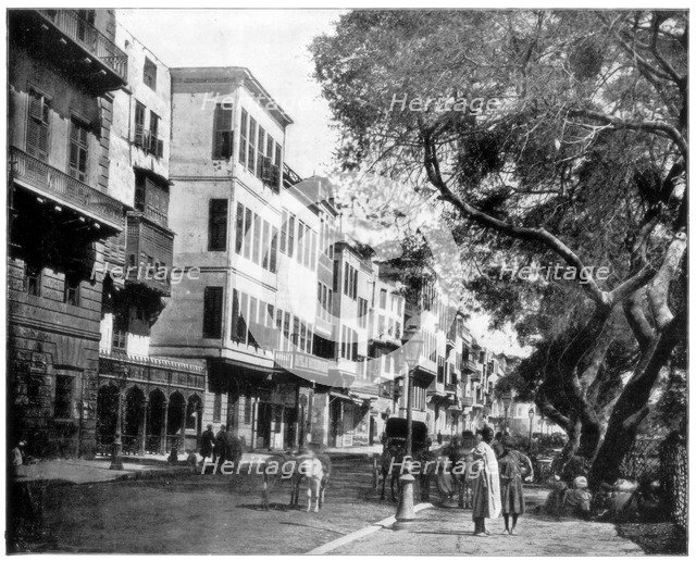 'The Ezbekiyeh and Street Scene, Cairo, Egypt', late 19th century. Artist: John L Stoddard
