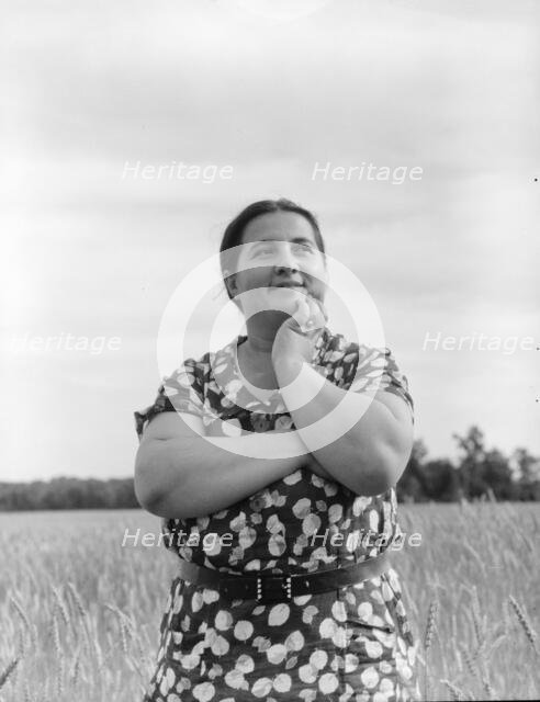 Jewish-American farm mother, Mrs. Cohen, wife of the farm manager, Hightstown, New Jersey, 1936. Creator: Dorothea Lange.