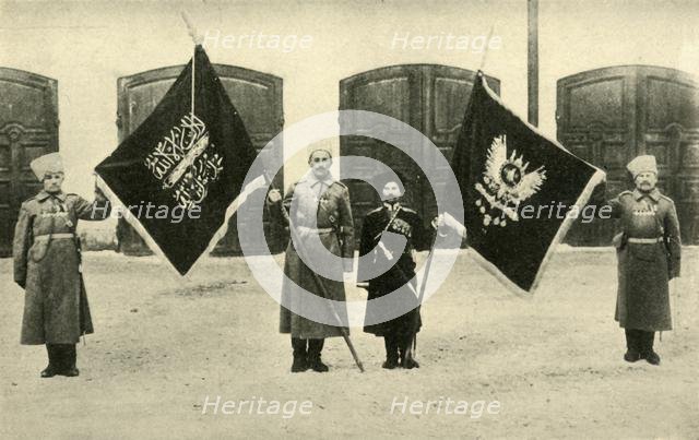Russian soldiers with captured Turkish flags, First World War, 1915-1916, (c1920). Creator: Unknown.