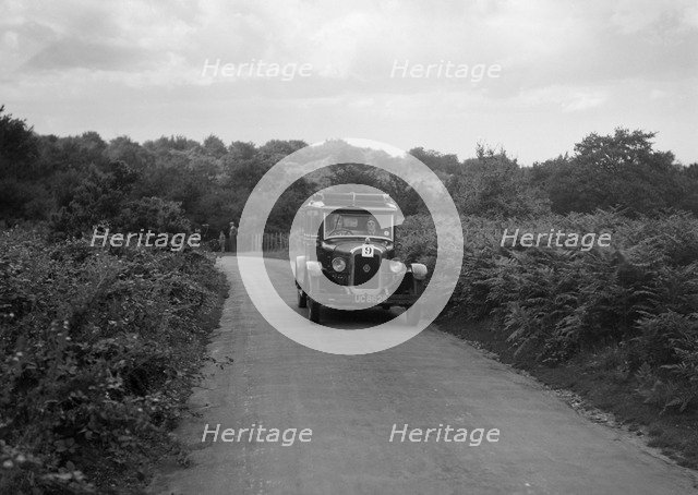 Austin 20 taking part in a First Aid Nursing Yeomanry trial or rally, 1931. Artist: Bill Brunell.
