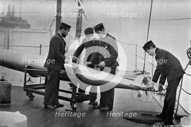 Torpedo instruction on board HMS 'Theseus', 1896.Artist: W Gregory