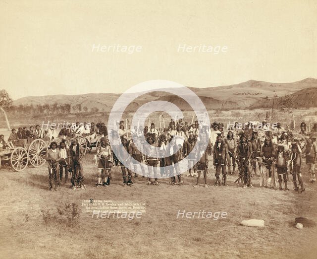 At the dance Part of the 8th US Cavalry and 3rd Infantry at the great Indian grass dance..., 1890. Creator: John C. H. Grabill.