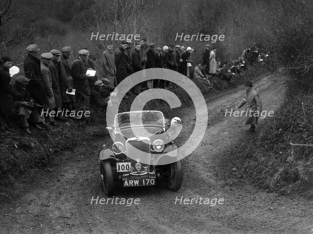 Singer Le Mans of J Eason-Gibson competing in the MCC Lands End Trial, 1935. Artist: Bill Brunell.