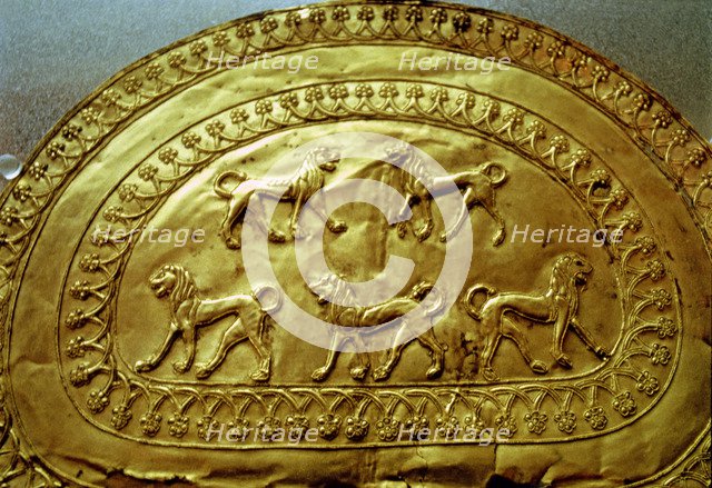 Etruscan gold fibula decorated with five lions, from the Regolini Galassi tomb.