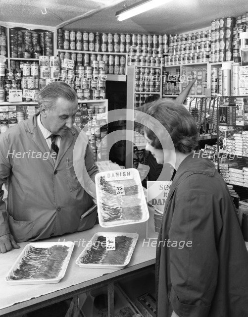 New metric system of selling bacon, Stocksbridge, Sheffield, South Yorkshire, 1966. Artist: Michael Walters