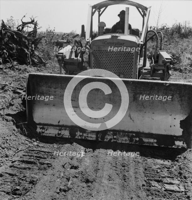 Bulldozer equipped with grader..., Nieman farm, near Vader, Lewis County, Western Washington, 1939. Creator: Dorothea Lange.