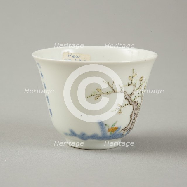 Underglaze blue month cup with polychrome enamelled decoration of a prunus tree. Artist: Unknown.