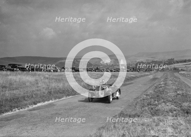 Frazer-Nash BMW competing in the Bugatti Owners Club Lewes Speed Trials, Sussex, 1937. Artist: Bill Brunell.