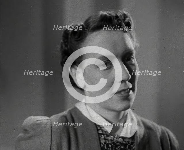 A Woman With Her Hair Cut in the 'Victory' Style, 1942. Creator: British Pathe Ltd.