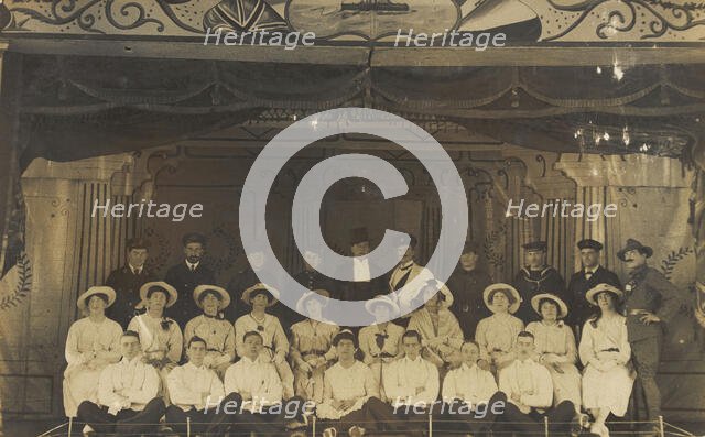 Men on a large stage set, [between 1910 and 1919 and between 1920 and 1929?]. Creator: Unknown.
