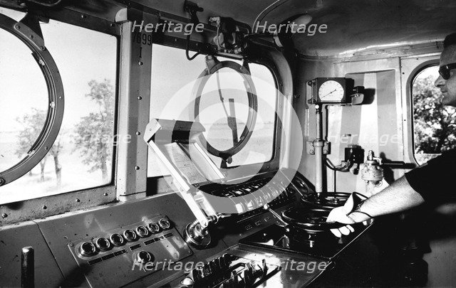 Inside the cab of an electric locomotive, 1950.
