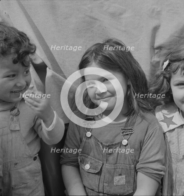 Children of migratory carrot pullers, Mexicans, Imperial Valley, California, 1937. Creator: Dorothea Lange.