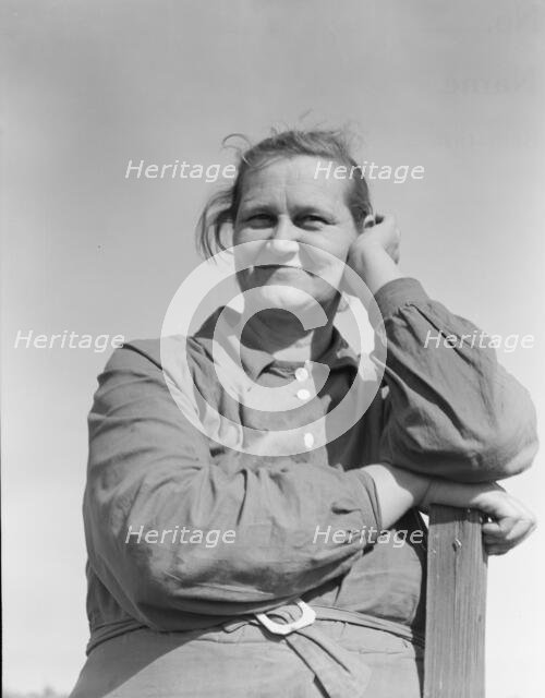 Arkansas mother, now a rural rehabilitation client, Tulare County, California, 1938. Creator: Dorothea Lange.