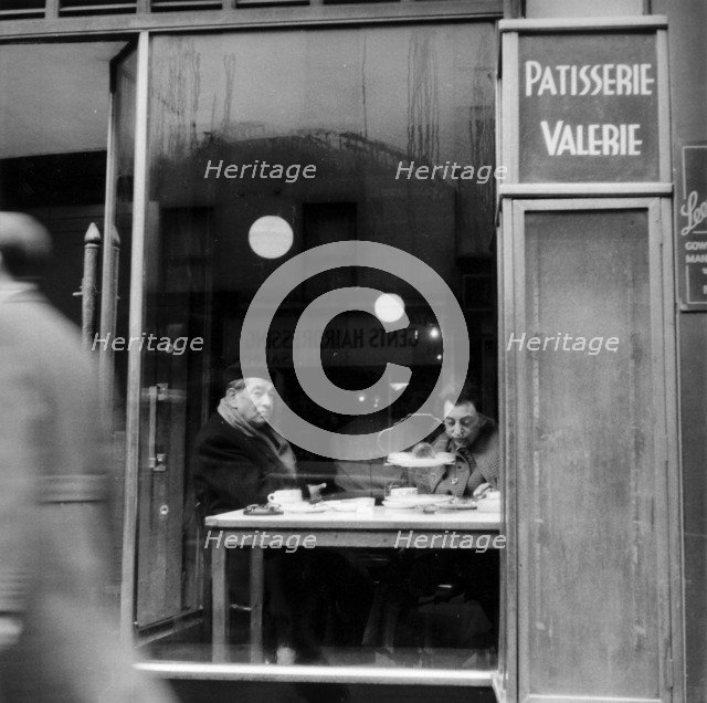 Italians eating and drinking in a cafe in Soho, London, 1955. Artist: Henry Grant