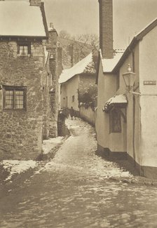 [Snow on roofs, alleyway]. From the album: Photograph album - England, 1920s. Creator: Harry Moult.