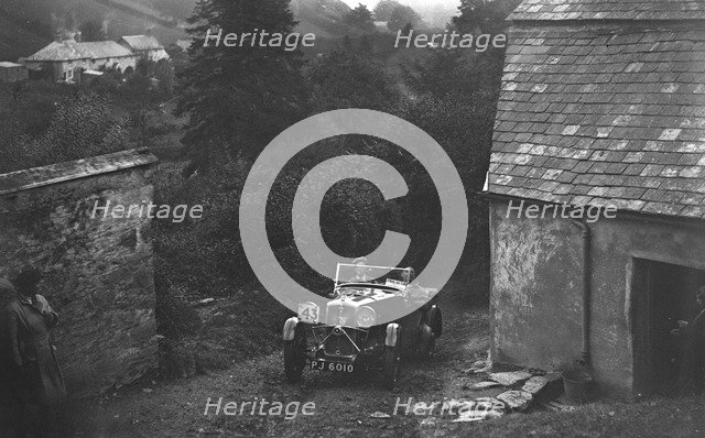 1932 Wolseley Hornet of N Tracey competing in the JCC Lynton Trial, 1932. Artist: Bill Brunell.