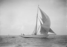 The cutter 'Westwind' sailing with spinnaker, 1912. Creator: Kirk & Sons of Cowes.