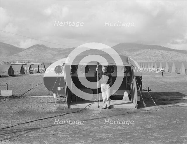 The camp manager, the office trailer and view of FSA camp, Merrill, Klamath County, Oregon, 1939. Creator: Dorothea Lange.