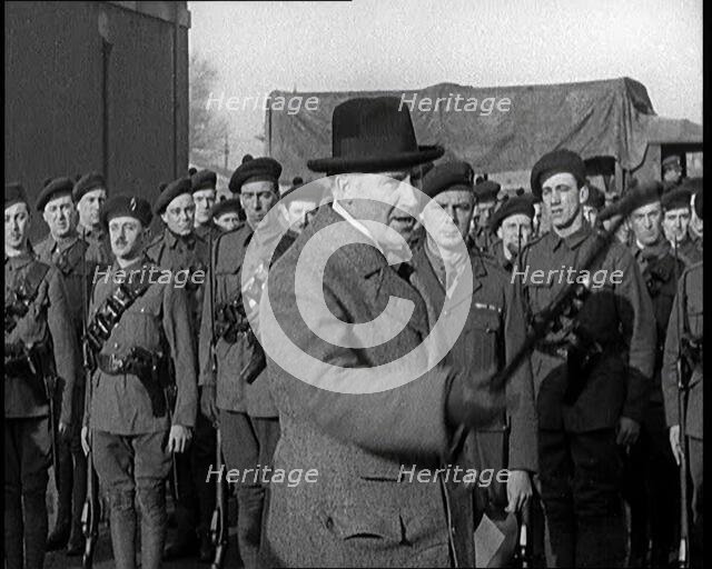 A British Man Inspecting and Speaking to Lines of Irish Auxiliary Soldiers, 1921. Creator: British Pathe Ltd.