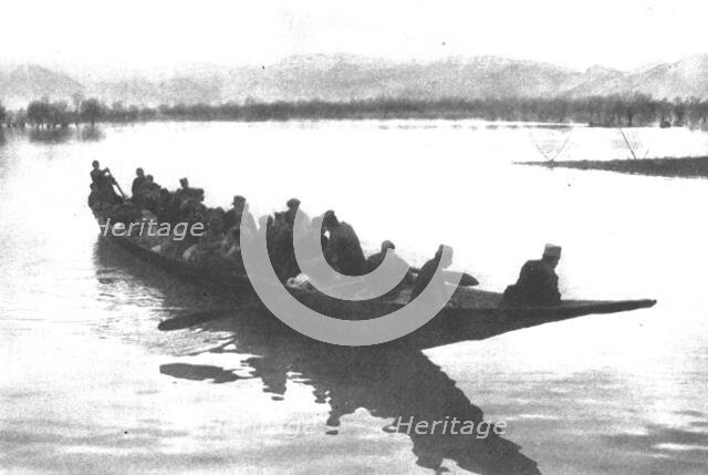''Les Serbes a Scutari d'Albanie; deputes de la Skoupchtina traversant le lac de Scutari.', 1916. Creator: Samson Tchernoff.