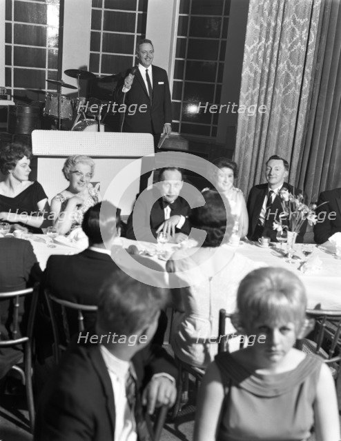 Compere at a social evening, Doncaster, South Yorkshire, 1964.  Artist: Michael Walters