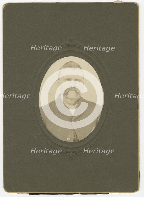 Photograph of a man with a mustache wearing a dark jacket, late 19th century. Creator: Unknown.