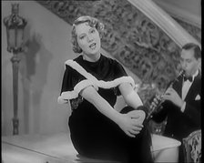 The Singer Elsie Carlisle and Her Band Performing a Song About Her Boyfriend Who Has Gone..., 1931. Creator: British Pathe Ltd.