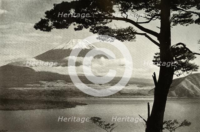 'Fuji from Lake Motosu', 1910. Creator: Herbert Ponting.