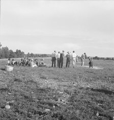 Farmers' baseball game in the country, on U.S. 62, near Mountain Home, northern Arkansas, 1938. Creator: Dorothea Lange.