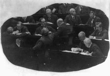 Opening of the 60th Congress - view of group of Congressmen at their desks, reading..., c1907 - 1909 Creator: Unknown.