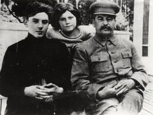 Soviet leader Josef Stalin with his son Vasily and daughter Svetlana, 1930s.  Artist: Pyotr Otsup.