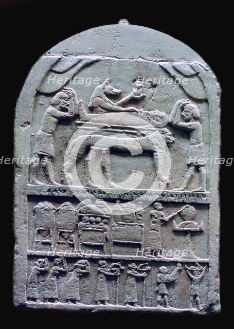 Egyptian stele showing Anubis preparing a mummy. Artist: Unknown