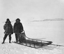 Mr. Bowen and Mr. Delezene with racing sled in an All Alaska Sweepstakes, between c1900 and 1927. Creator: Unknown.