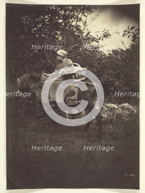 Female Peasant Riding Donkey, 1870. Creator: Giraudon's Artist.