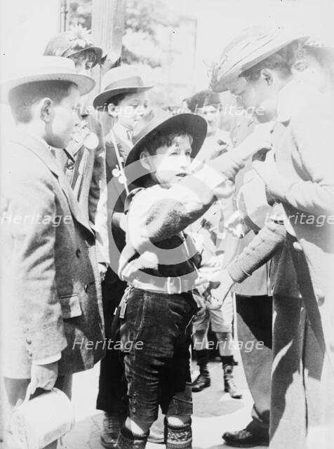 Boy Scout, Paris, Selling "Journee Francaise" Medals, between 1914 and c1915. Creator: Bain News Service.