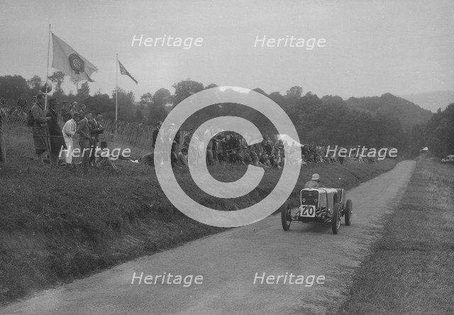Singer competing in the Shelsley Walsh Hillclimb, Worcestershire, 1935. Artist: Bill Brunell.