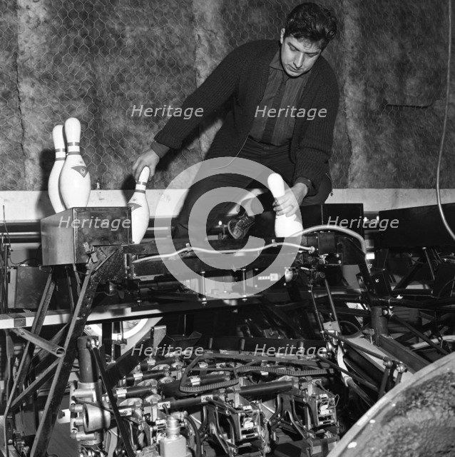 Loading bowling pins at Silver Blades Ice Rink, Sheffield, South Yorkshire, 1964.   Artist: Michael Walters