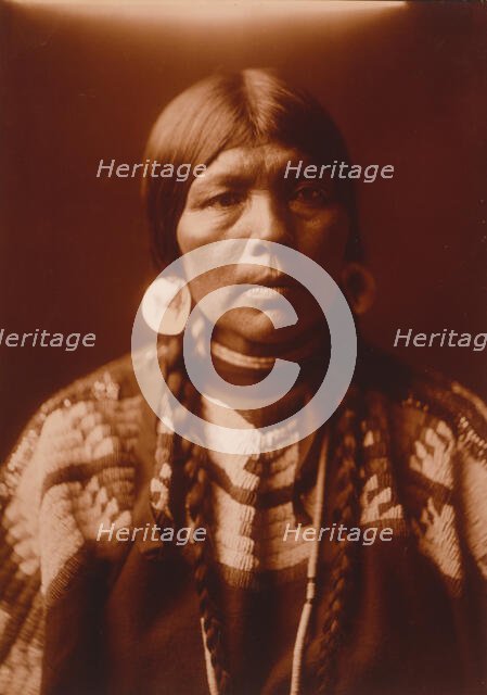 The wife of Ow High, c1905. Creator: Edward Sheriff Curtis.