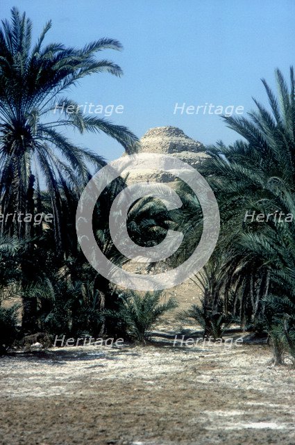 Step Pyramid (behind palms) of King Djoser (Zozer), Saqqara, Egypt, 3rd Dynasty, c2600 BC. Artist: Imhotep