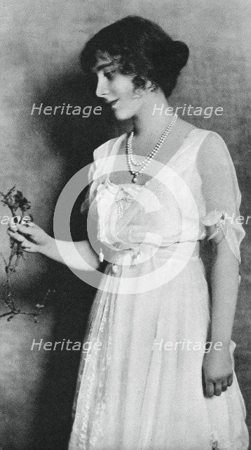 Lady Elizabeth Bowes-Lyon with a red carnation, 1923, (1937).  Creator: Unknown.