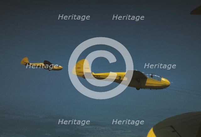 Marine gliders being towed from Page Field, Parris Island, S.C., 1942. Creator: Alfred T Palmer.