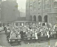 Children displaying their drawings, Flint Street School, Southwark, London, 1908. Artist: Unknown.