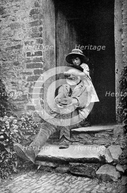 A child with her grandfather, England, c1922.Artist: AW Cutler