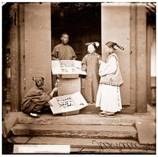 China: Manchu women buying flowers for their headdress, Beijing, 1869. Creator: John Thomson.