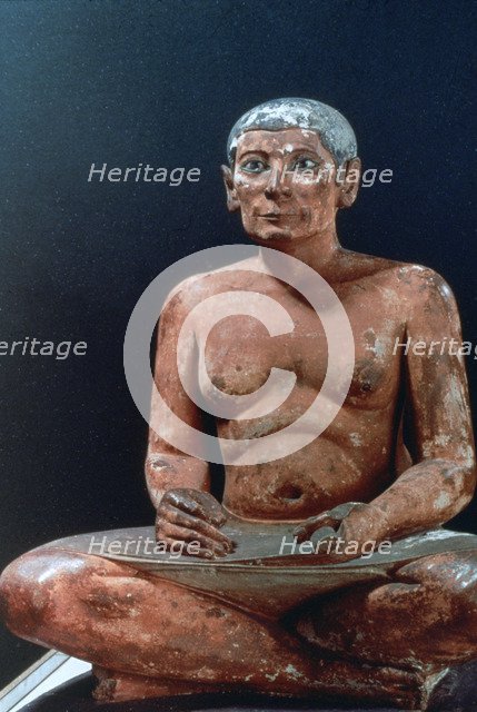 Ancient Egyptian figure of a seated scribe, 25th-24th century BC. Artist: Unknown