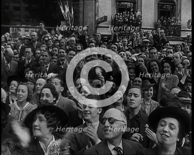 Close up a Section of the Crowd Spectating at  a Bastille Day Military Parade With People..., 1939. Creator: British Pathe Ltd.