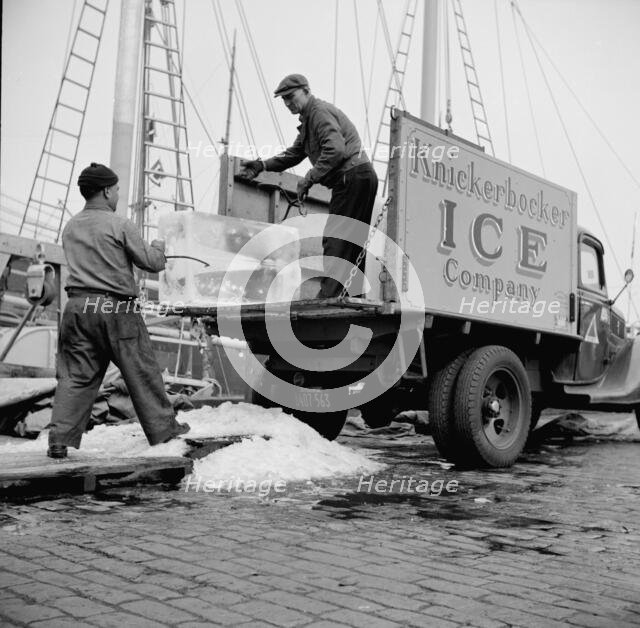 Ice used to store fish in ships, New York, 1943. Creator: Gordon Parks.