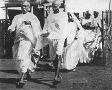 Mohandas Gandhi, Indian nationalist leader, on his way to Congress, 1932. Artist: Anon